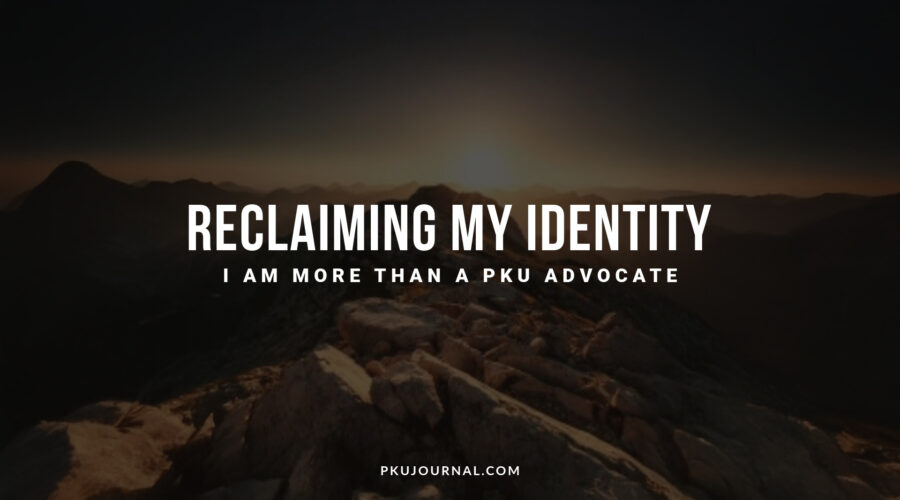Wide-angle dark mountain peak at dawn with the text: "Reclaiming My Identity. I am more than a PKU advocate."