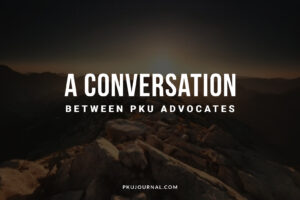 Title graphic for "A Conversation Between PKU Advocates" on PKUJournal.com, featuring bold white text over a dark mountain landscape at dusk.